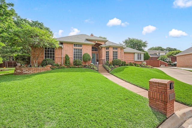 6808 N Oaks Dr, North Richland Hills, TX 76182 - view of front of property with brick siding, a shingled roof, and a chimney