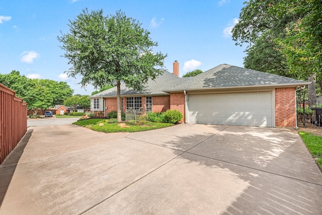 6808 N Oaks Dr, North Richland Hills, TX 76182 - single story home with brick siding, concrete driveway, an attached garage, and roof with shingles
