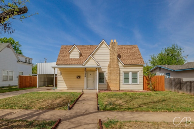 1126 Grand Ave, Abilene, TX 79605 - view of front of house featuring driveway, a chimney, and roof with shingles