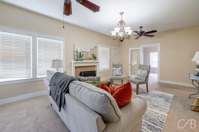 1126 Grand Ave, Abilene, TX 79605 - living area with a ceiling fan, light colored carpet, a brick fireplace, and baseboards