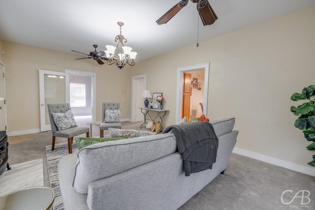 1126 Grand Ave, Abilene, TX 79605 - living area featuring a ceiling fan, baseboards, a chandelier, and light colored carpet
