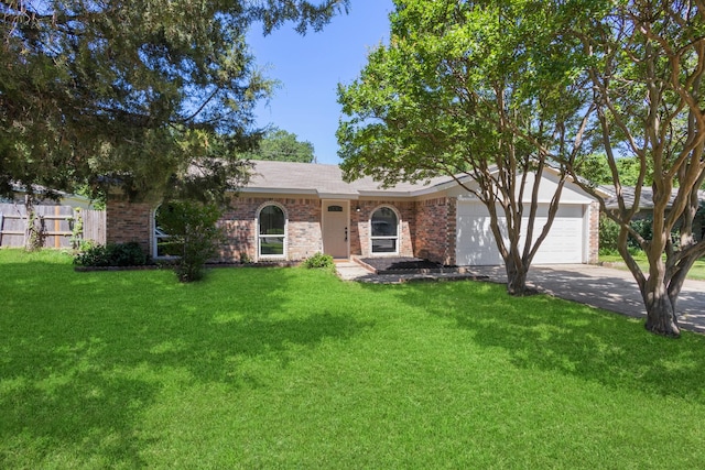 6206 Springwood Dr, Arlington, TX 76001 - single story home with asphalt driveway, a garage, and brick siding