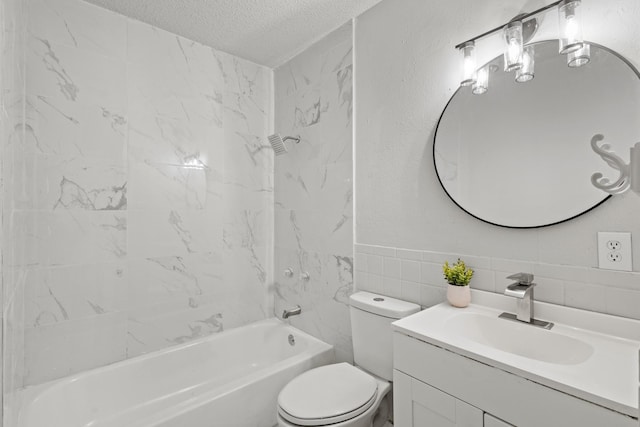 6206 Springwood Dr, Arlington, TX 76001 - full bath featuring a textured ceiling, tile walls, vanity, tub / shower combination, and toilet