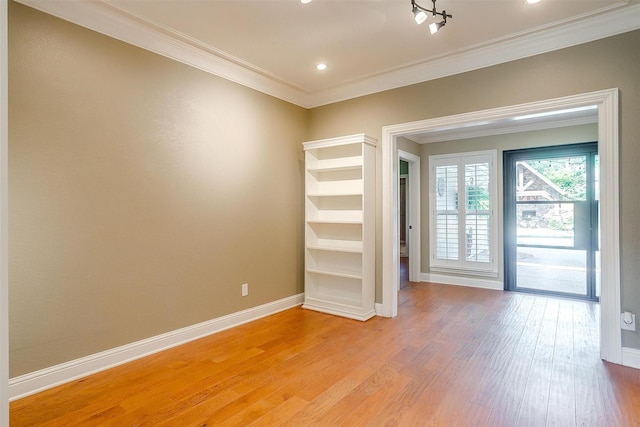 5800 Montford Dr, Colleyville, TX 76034 - spare room featuring crown molding, light wood-style floors, baseboards, and recessed lighting