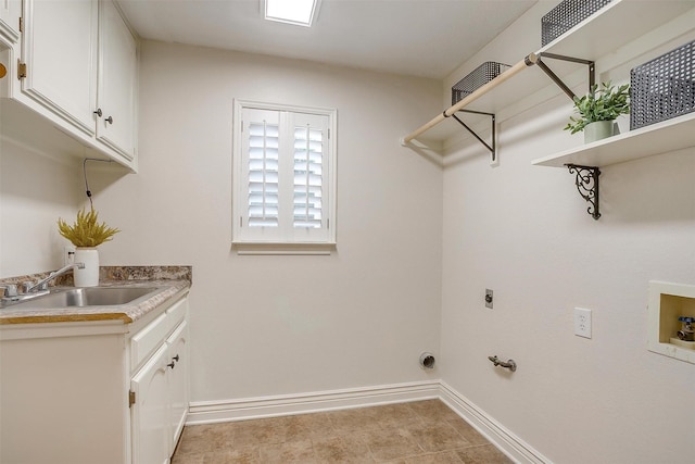 5800 Montford Dr, Colleyville, TX 76034 - laundry room with hookup for an electric dryer, baseboards, washer hookup, cabinet space, and hookup for a gas dryer