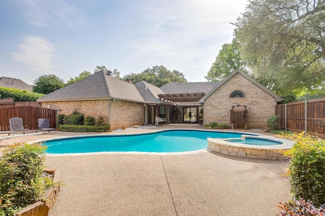 5800 Montford Dr, Colleyville, TX 76034 - view of swimming pool featuring a patio and a pool with connected hot tub