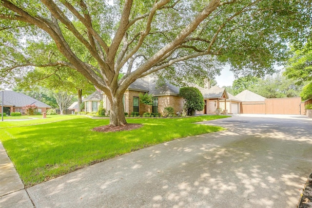 5800 Montford Dr, Colleyville, TX 76034 - view of front of house with brick siding and a front yard