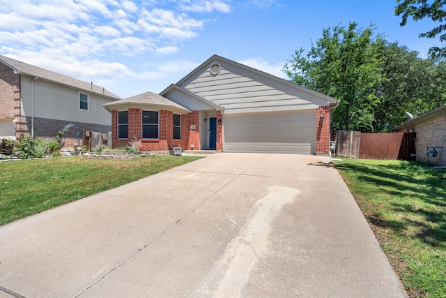7612 Brittany Pl, Fort Worth, TX 76137 - single story home featuring brick siding, driveway, and a garage