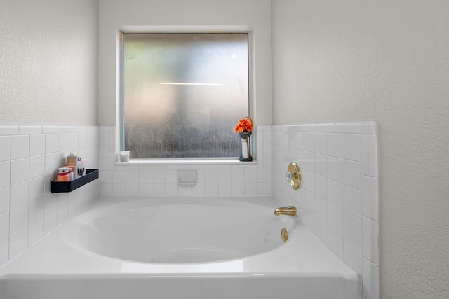 7612 Brittany Pl, Fort Worth, TX 76137 - full bath with a textured wall and a bath
