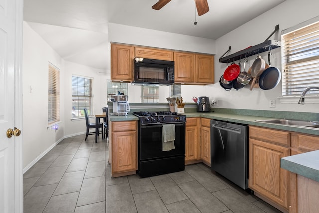 7612 Brittany Pl, Fort Worth, TX 76137 - kitchen with black appliances, a sink, ceiling fan, and light tile patterned floors