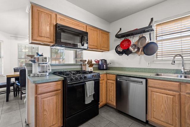7612 Brittany Pl, Fort Worth, TX 76137 - kitchen featuring black appliances, light tile patterned flooring, a sink, and a peninsula
