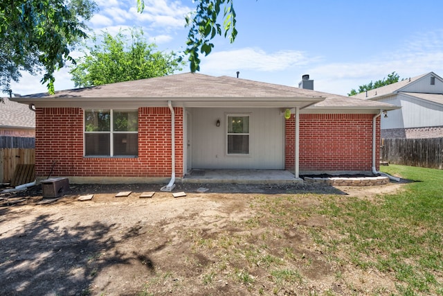 7612 Brittany Pl, Fort Worth, TX 76137 - view of front facade featuring brick siding, a patio, a chimney, and roof with shingles