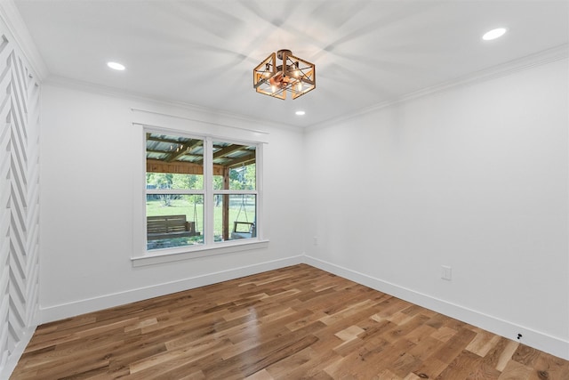 2925 Edmond Ave, Waco, TX 76707 - empty room featuring crown molding, light wood finished floors, a chandelier, recessed lighting, and baseboards