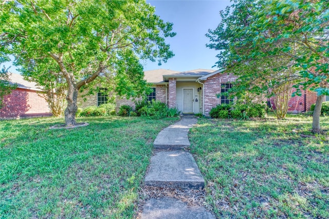 1209 Starpoint Ln, Wylie, TX 75098 - single story home with brick siding and a front yard