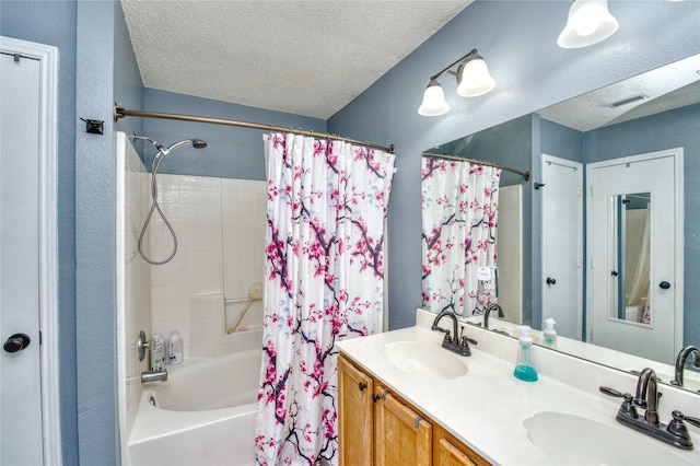 1209 Starpoint Ln, Wylie, TX 75098 - full bath featuring shower / bath combo, a textured ceiling, double vanity, and a textured wall