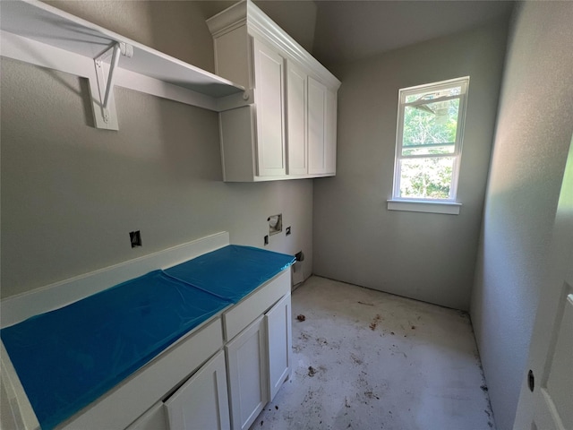 1057 Llano Way, Poolville, TX 76487 - laundry area with cabinet space and washer hookup