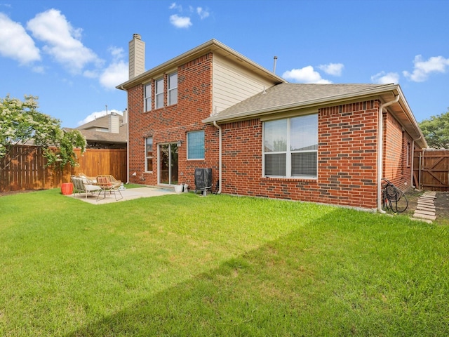 4340 Summer Star Ln, Fort Worth, TX 76244 - rear view of house featuring brick siding, a chimney, a patio area, a shingled roof, and central AC