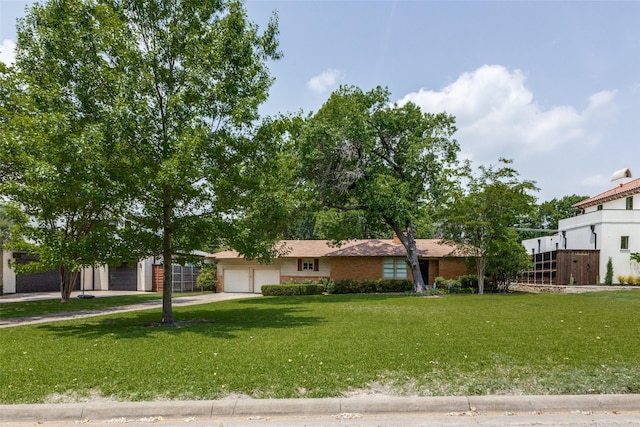8523 Santa Clara Dr, Dallas, TX 75218 - view of front facade with a garage, driveway, and a front yard