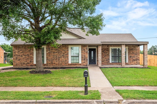 8810 Sugarberry Rd, Dallas, TX 75249 - ranch-style house featuring roof with shingles and brick siding