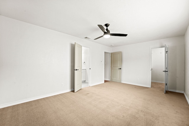 8810 Sugarberry Rd, Dallas, TX 75249 - unfurnished bedroom with light colored carpet, baseboards, a ceiling fan, and a spacious closet