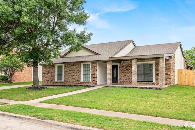8810 Sugarberry Rd, Dallas, TX 75249 - ranch-style house featuring a shingled roof and brick siding
