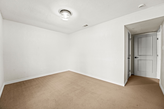 8810 Sugarberry Rd, Dallas, TX 75249 - empty room with carpet floors, baseboards, and a smoke detector