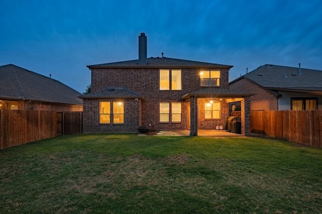 925 Lake Grove Dr, Little Elm, TX 75068 - rear view of property featuring a chimney, brick siding, and a patio