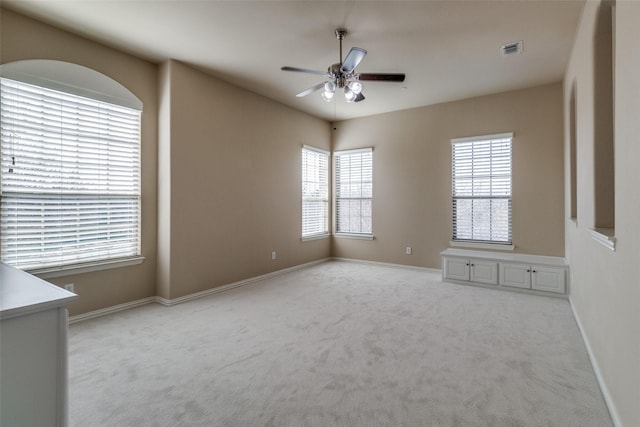 6101 Eagle Nest Dr, Garland, TX 75044 - unfurnished room featuring a ceiling fan, carpet floors, and baseboards