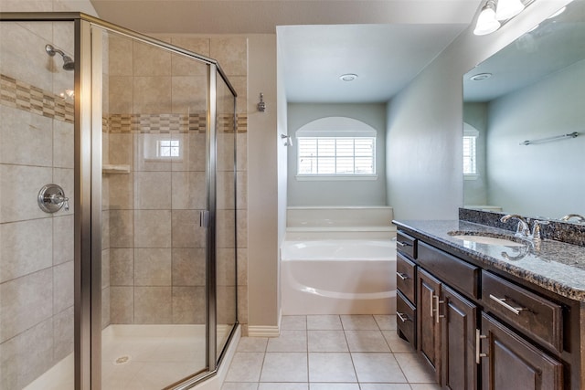 6101 Eagle Nest Dr, Garland, TX 75044 - full bathroom with a bath, vanity, a shower stall, and tile patterned floors