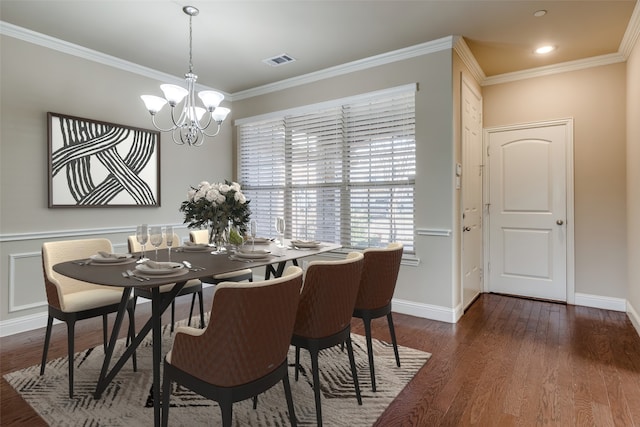 6101 Eagle Nest Dr, Garland, TX 75044 - dining room featuring a chandelier, ornamental molding, wood finished floors, and baseboards