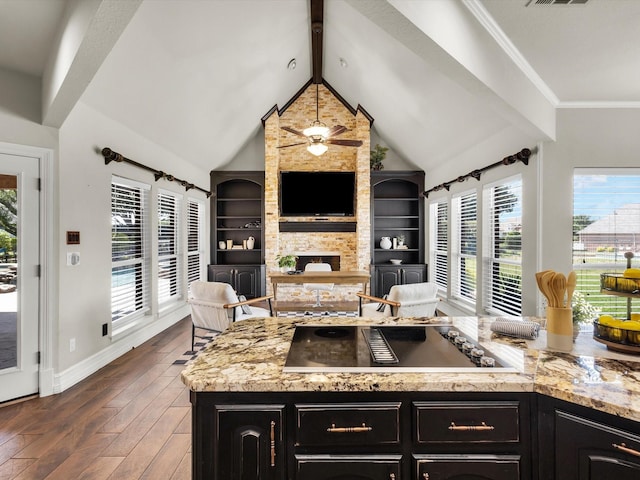 501 Las Lomas Dr, Heath, TX 75032 - kitchen with dark cabinets and healthy amount of natural light