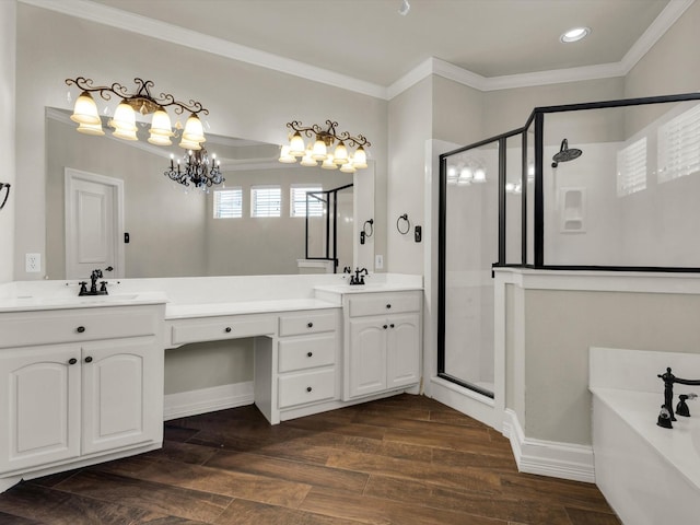 501 Las Lomas Dr, Heath, TX 75032 - bathroom with a shower stall, a garden tub, double vanity, crown molding, and recessed lighting