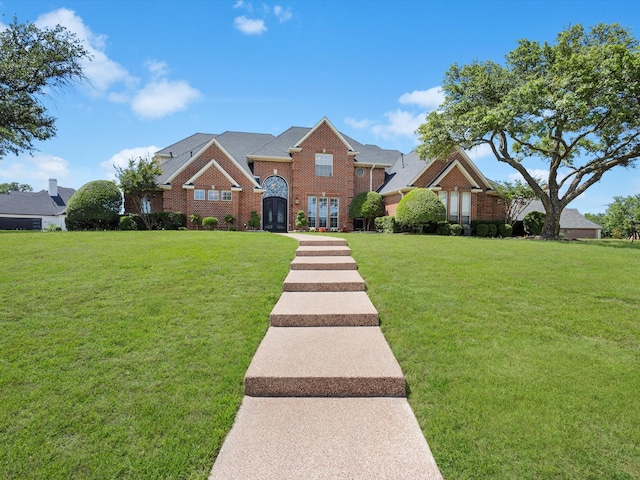 501 Las Lomas Dr, Heath, TX 75032 - view of front of house with brick siding and a front lawn