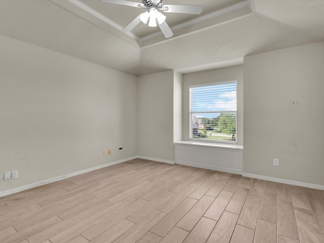 501 Las Lomas Dr, Heath, TX 75032 - empty room featuring a raised ceiling, light wood-style flooring, a ceiling fan, and ornamental molding