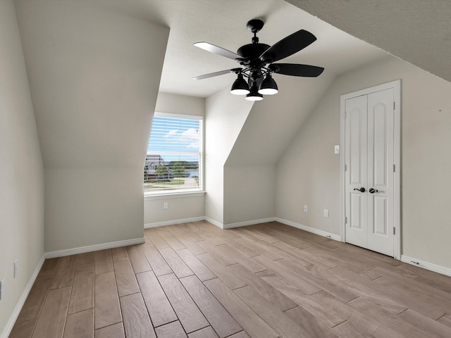 501 Las Lomas Dr, Heath, TX 75032 - additional living space with light wood-type flooring, ceiling fan, and lofted ceiling