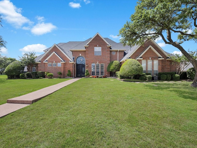 501 Las Lomas Dr, Heath, TX 75032 - view of front of home featuring brick siding and a front lawn