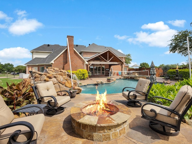 501 Las Lomas Dr, Heath, TX 75032 - outdoor pool featuring a fire pit and a patio area
