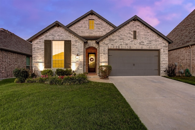 3514 Charleston Dr, Melissa, TX 75454 - french country home with brick siding, concrete driveway, a yard, and a garage