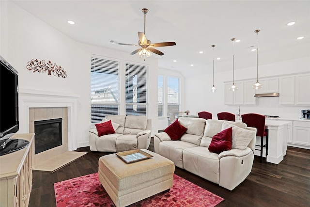 3514 Charleston Dr, Melissa, TX 75454 - living room featuring ceiling fan, dark wood-type flooring, a fireplace, recessed lighting, and lofted ceiling
