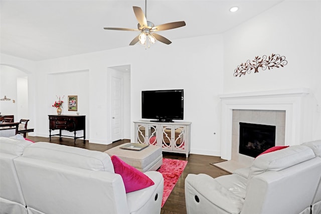 3514 Charleston Dr, Melissa, TX 75454 - living room featuring arched walkways, dark wood finished floors, ceiling fan, recessed lighting, and baseboards
