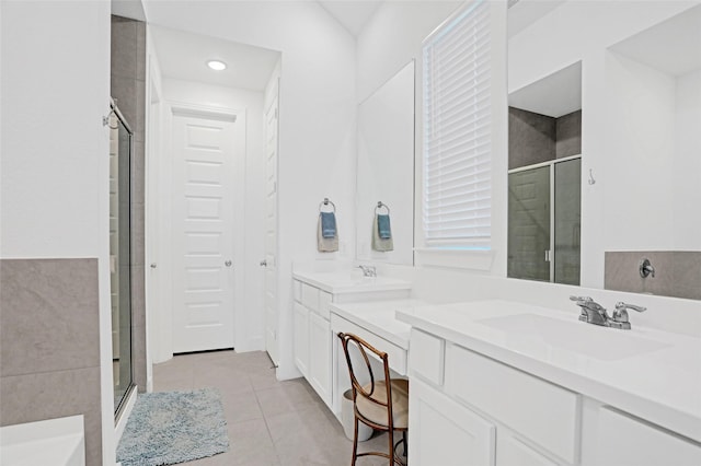 3514 Charleston Dr, Melissa, TX 75454 - bathroom with a stall shower, double vanity, tile patterned flooring, and recessed lighting