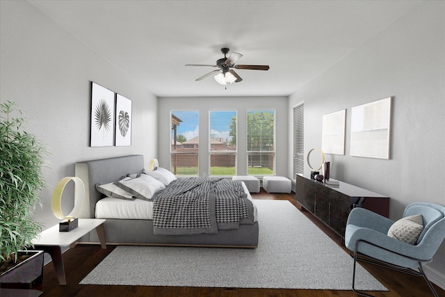 2256 Laurel Forest Dr, Fort Worth, TX 76177 - bedroom with a textured wall, wood finished floors, and ceiling fan