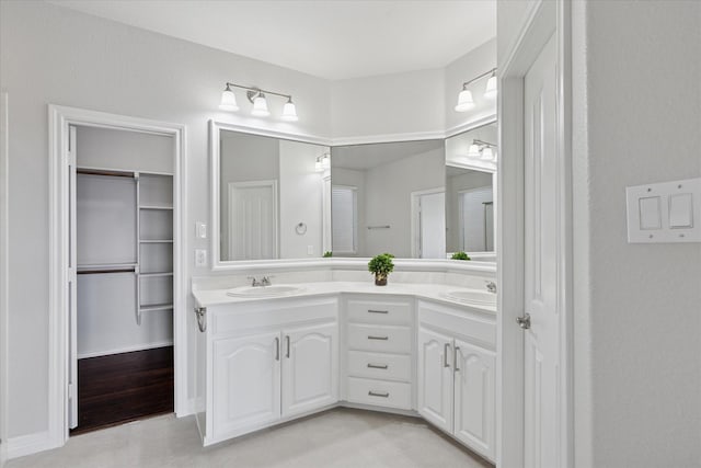 2256 Laurel Forest Dr, Fort Worth, TX 76177 - bathroom with double vanity and baseboards