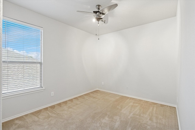 2256 Laurel Forest Dr, Fort Worth, TX 76177 - unfurnished room featuring light colored carpet, a ceiling fan, plenty of natural light, and baseboards