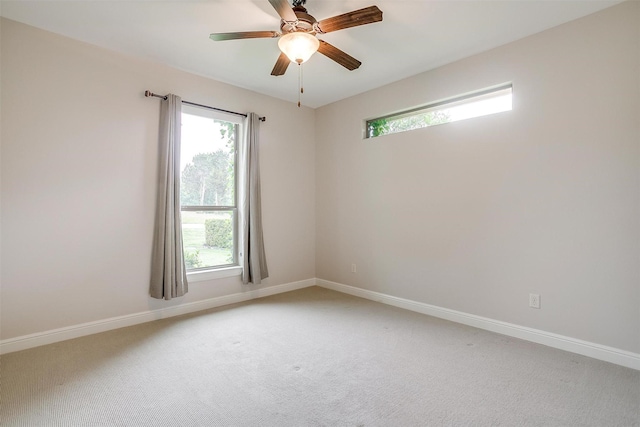 6005 Selkirk Ct, Cleburne, TX 76033 - spare room featuring ceiling fan, light colored carpet, and baseboards