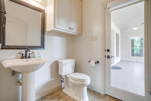 6005 Selkirk Ct, Cleburne, TX 76033 - bathroom with toilet and baseboards
