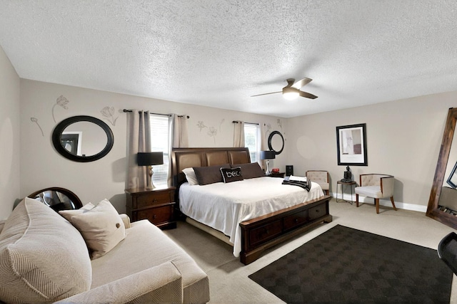 2908 Quail Run Dr, Mesquite, TX 75149 - carpeted bedroom with ceiling fan and a textured ceiling