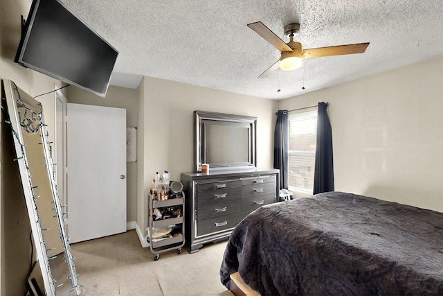 2908 Quail Run Dr, Mesquite, TX 75149 - bedroom featuring light carpet, a ceiling fan, and a textured ceiling