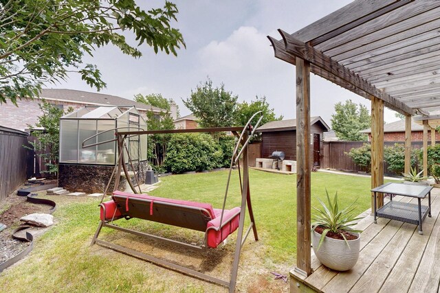 2908 Quail Run Dr, Mesquite, TX 75149 - view of yard featuring an exterior structure, an outbuilding, a deck, and a pergola