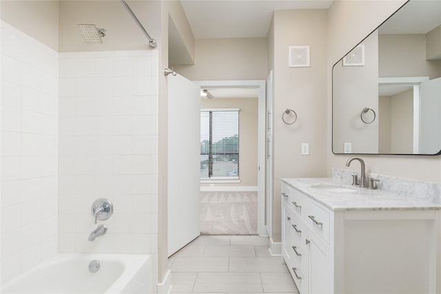 4605 Cedar Springs Rd Unit 201, Dallas, TX 75219 - full bath featuring vanity,  shower combination, tile patterned flooring, and baseboards
